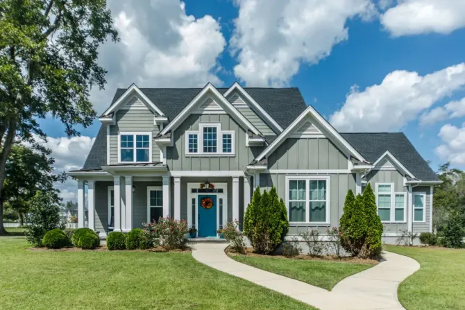 A large house with a blue door in southern Connecticut