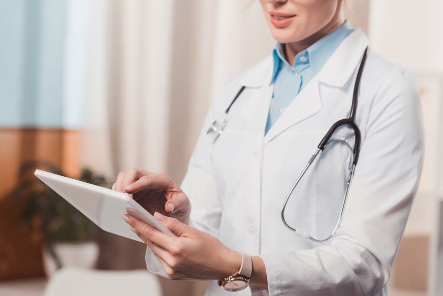 Doctor using tablet