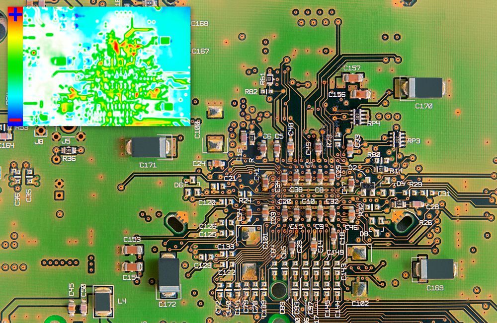 A close-up of a green circuit board with a small, superimposed thermal imaging overlay showing heat signatures.