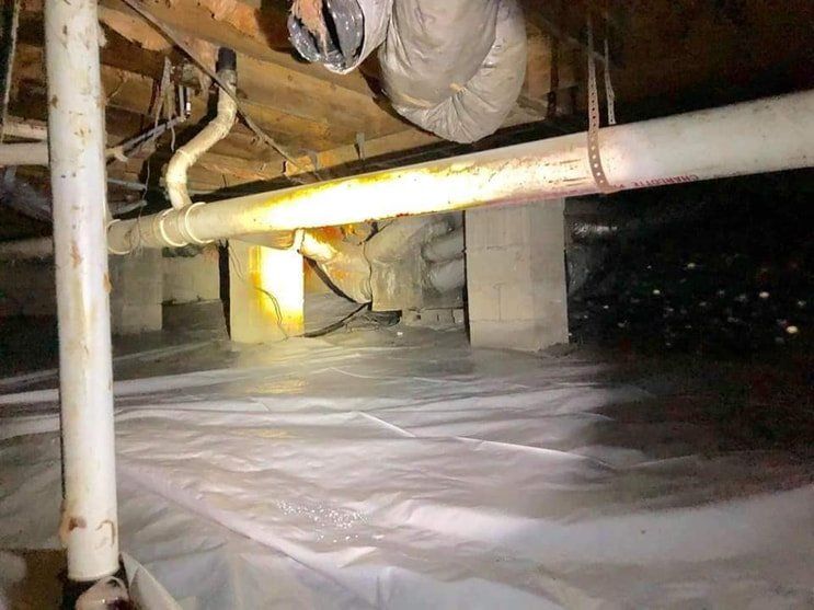 Crawl space under the home, where basement waterproofing is essential to prevent flooding and structural damage