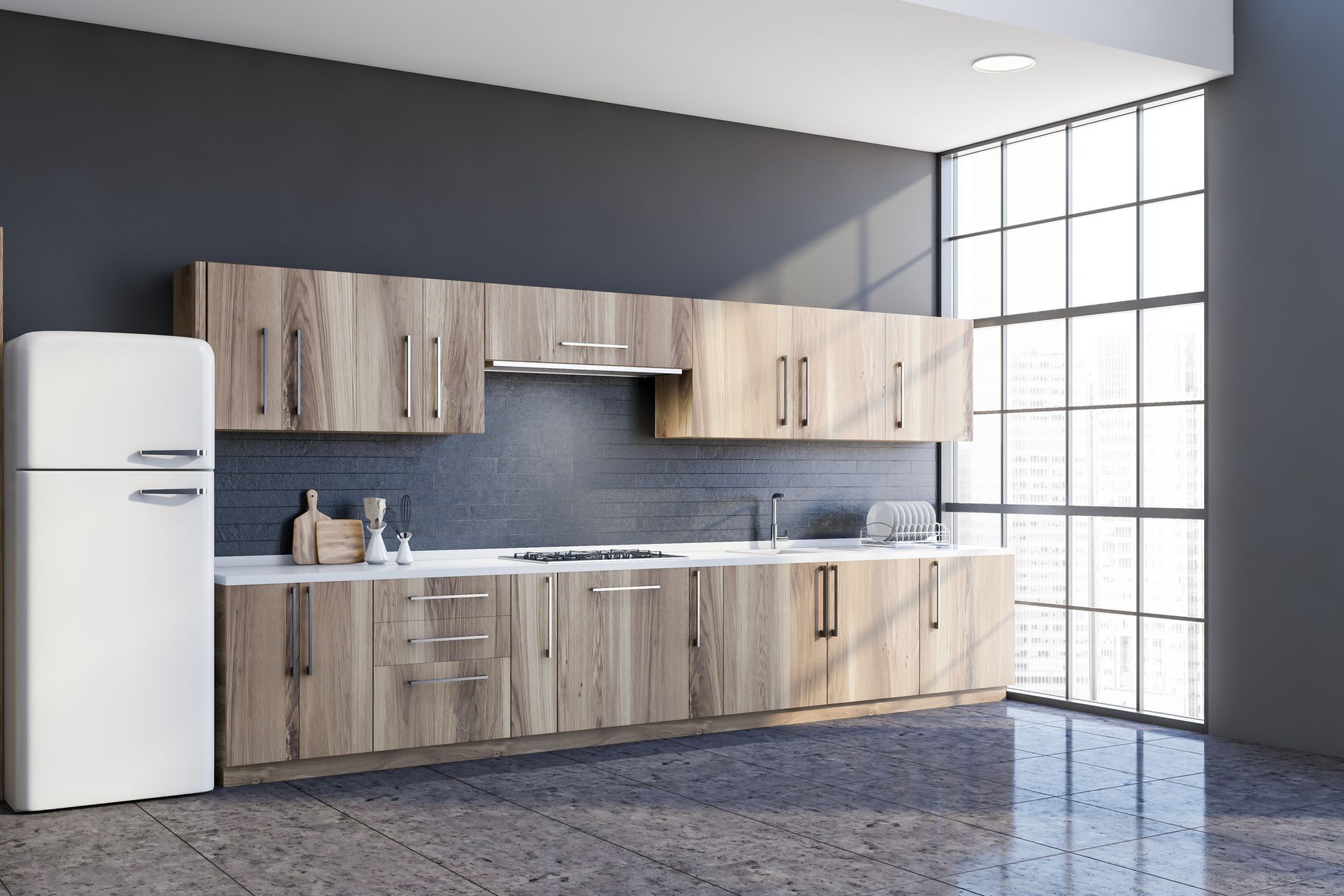 A kitchen with wooden cabinets and a white refrigerator