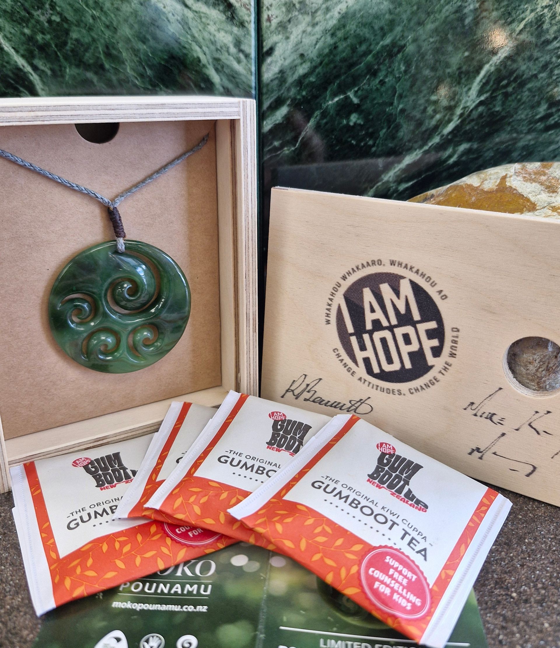 A necklace with a pendant that says i am hope