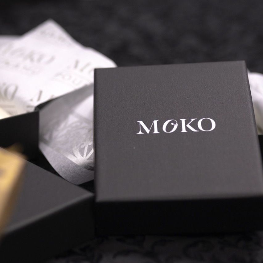 A black box with the word moko on it