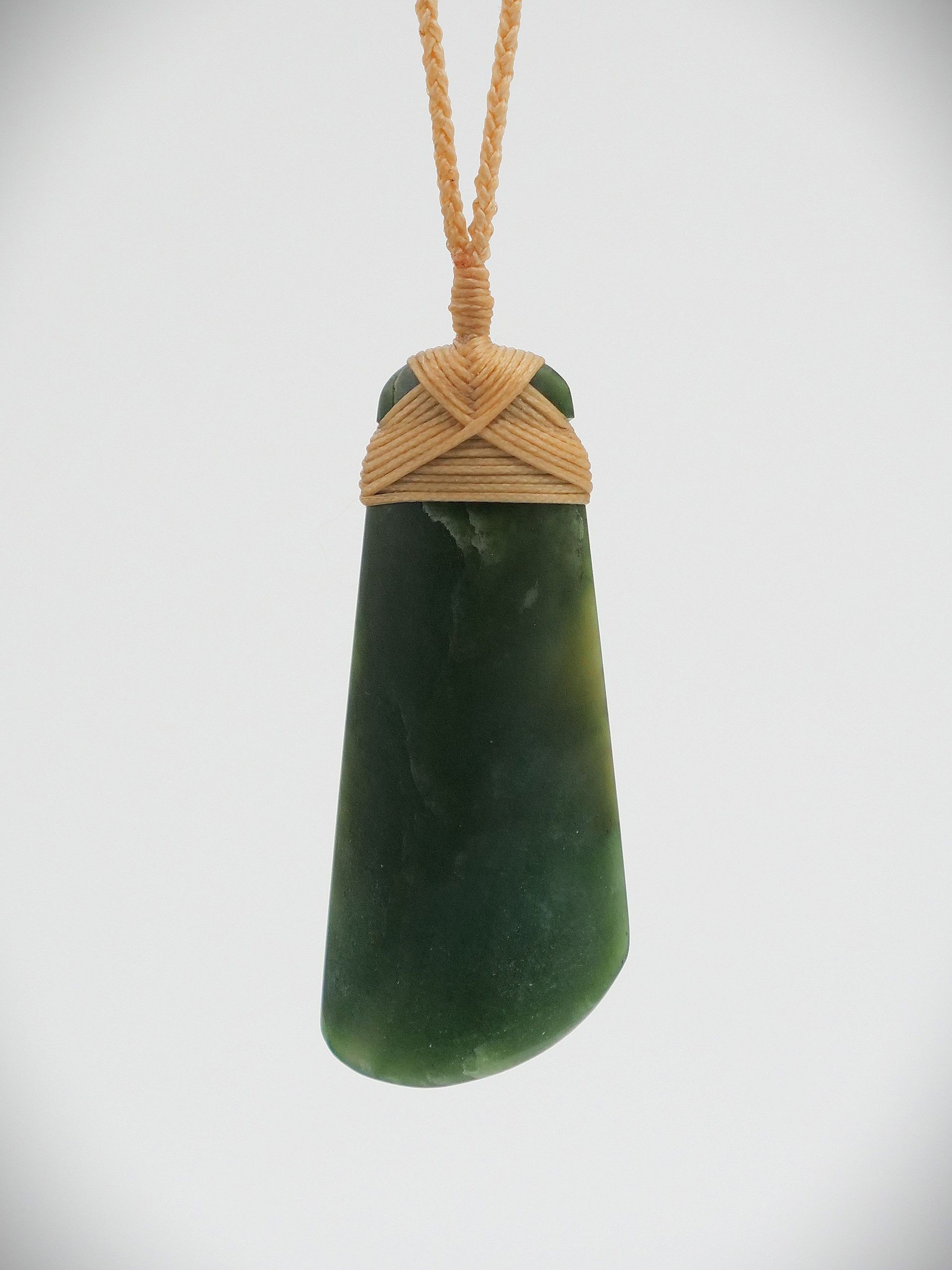 Greenstone toki pendant meaning