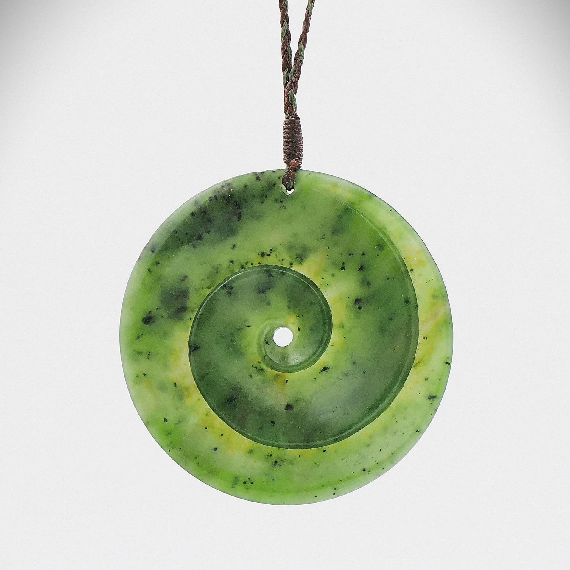 A greenstone koru pendant design