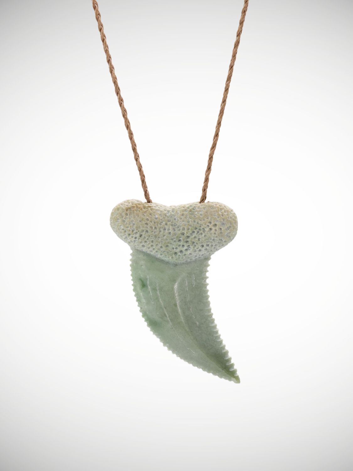 Rei niho carved pendant meaning