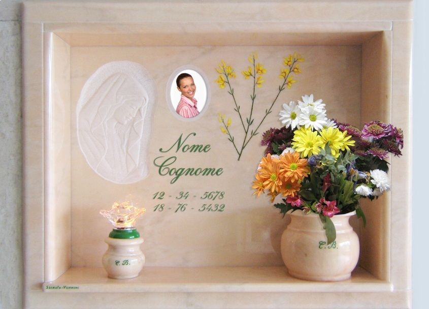 Lapide con fiori