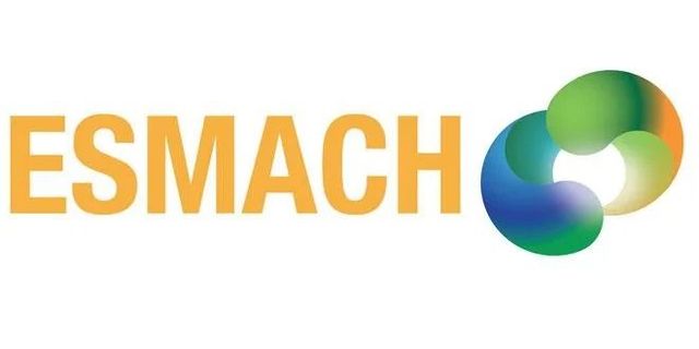 "ESMACH" in testo giallo senape con un logo multicolore a spirale.