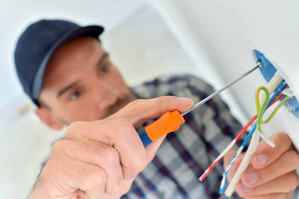 Electrician Wiring a New Build — Level 2 Electrician in Toukley, NSW