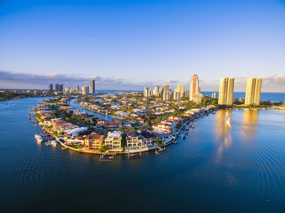 An Aerial View of a City on a Small Island in the Middle of Water — Eva Professional Painting in Nerang, QLD