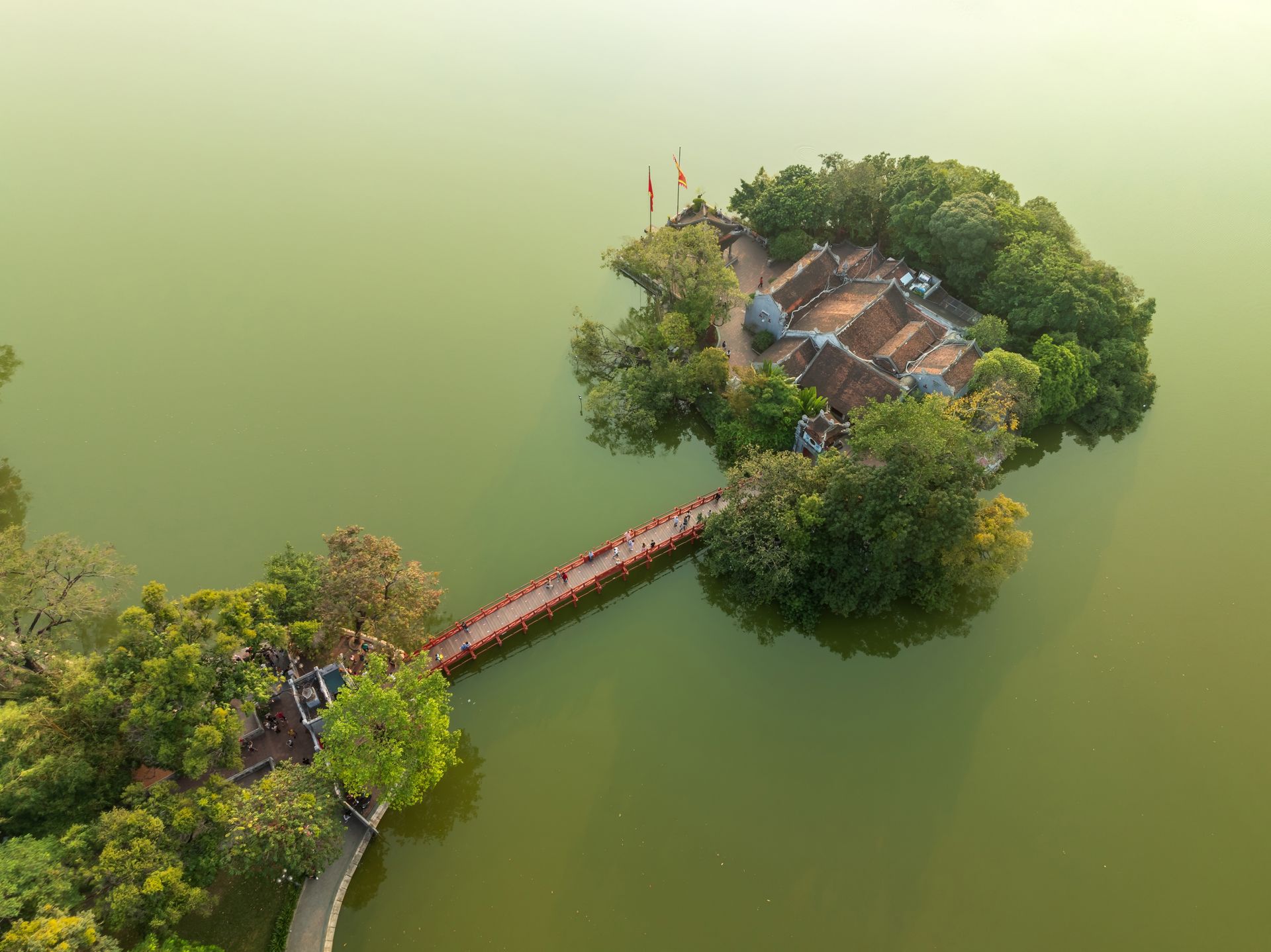 The Huc Bridge spans Hoan Kiem Lake to Ngoc Son Temple.