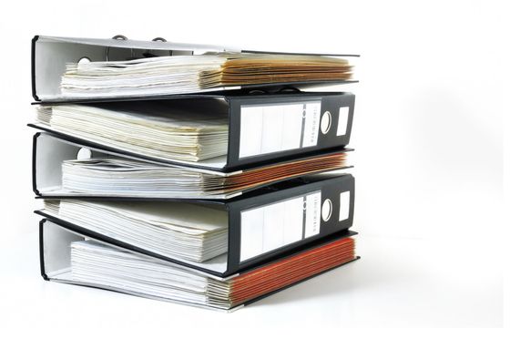 Stack of tax binders