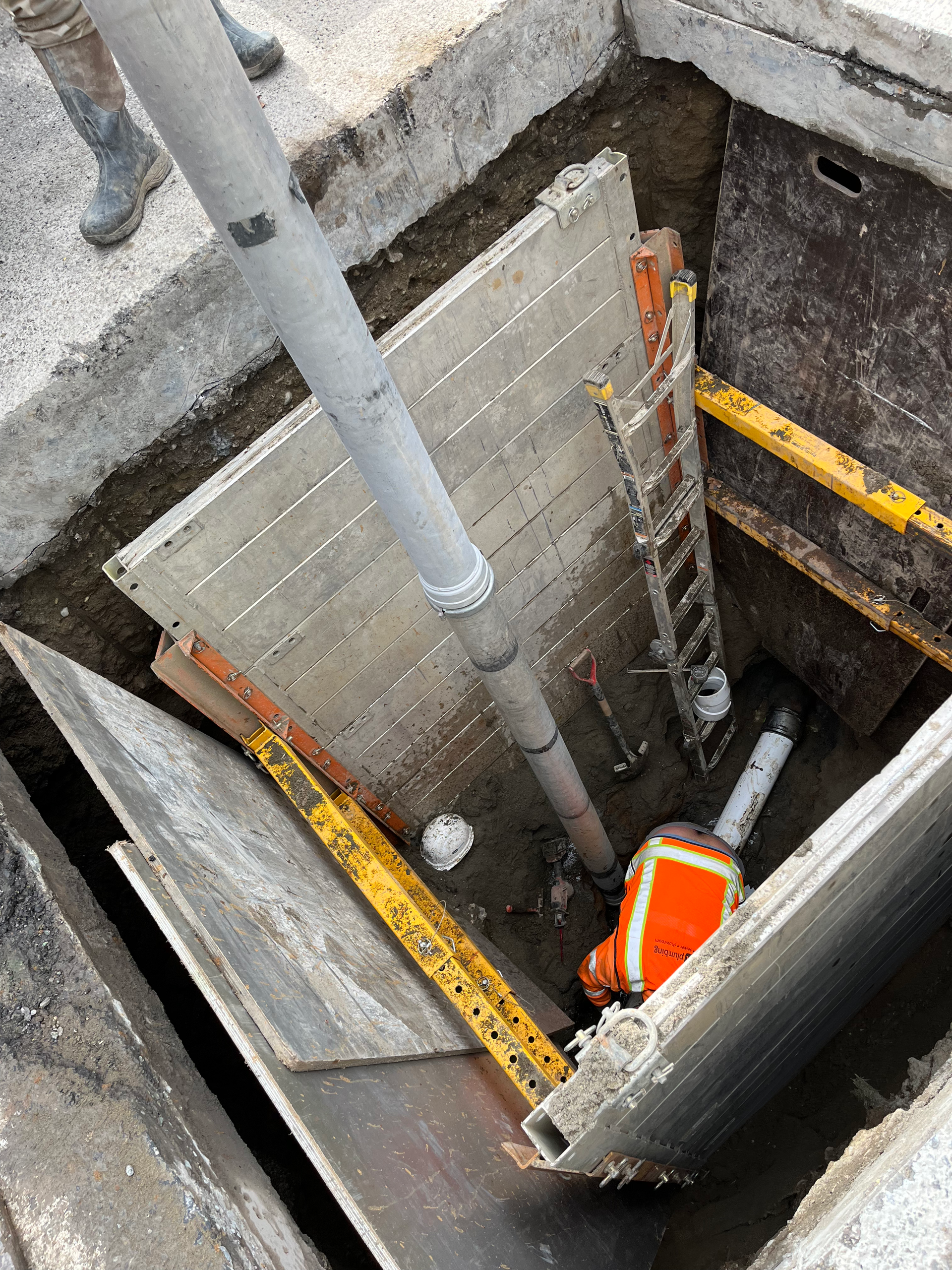 Underground pipe access during a plumbing repair project
