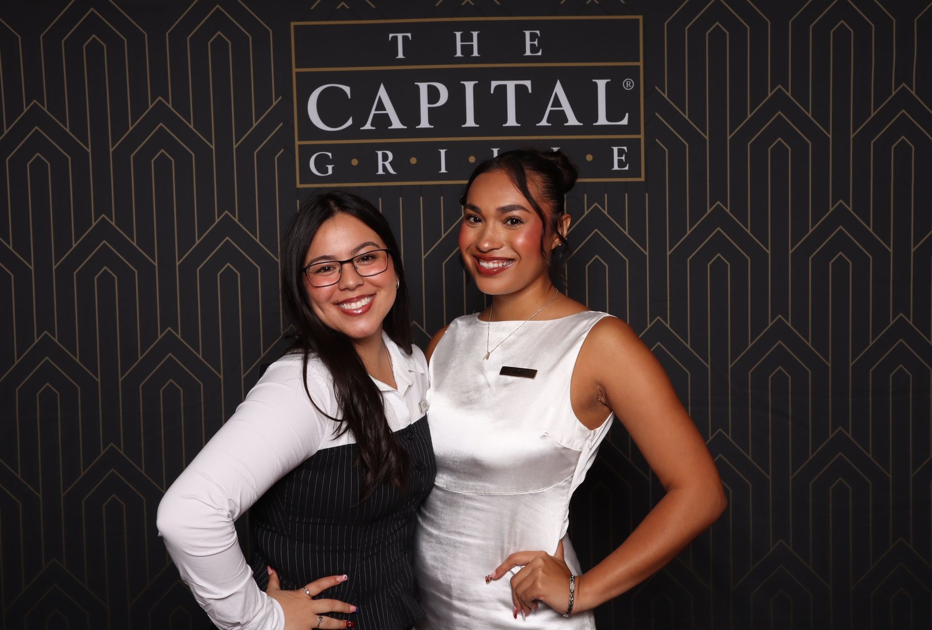 The Capital Grille team members posing together during the San Antonio restaurant anniversary celebration