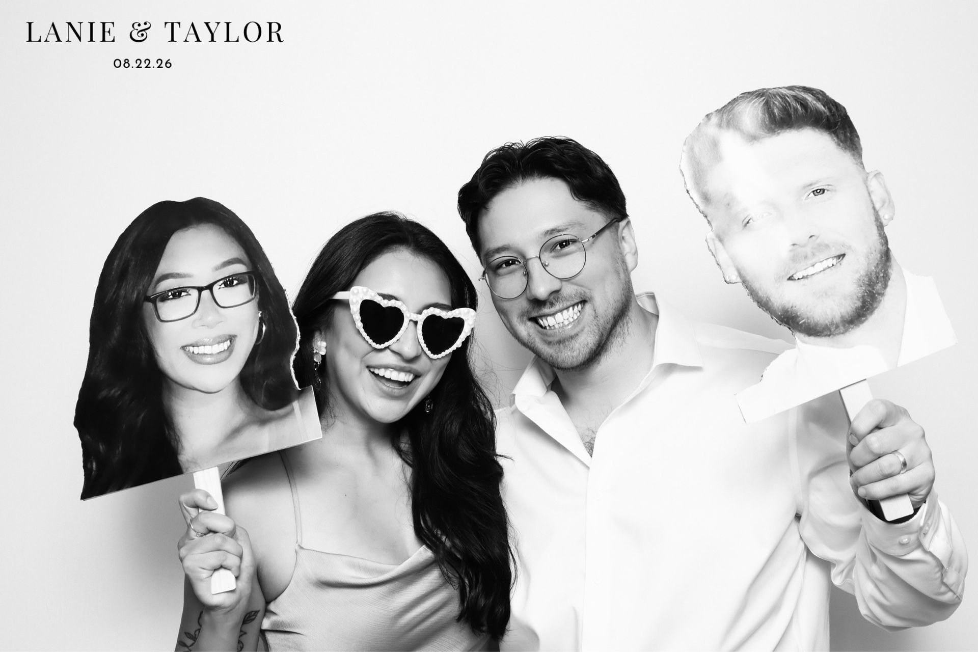 wedding guests having fun with props in Glam Photo Booth at Kendall Point wedding