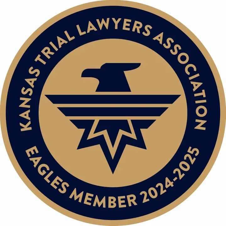 The kansas trial lawyers association eagles member logo