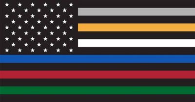 Black American flag with colored stripes representing first responders and military branches.