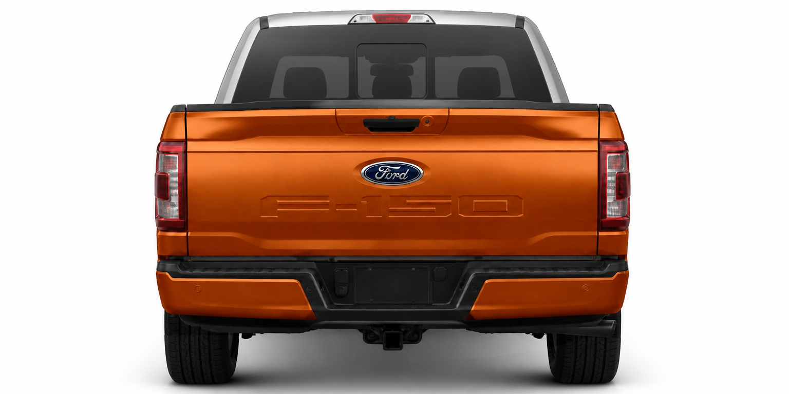 Rear view of an orange Ford pickup truck on a white background