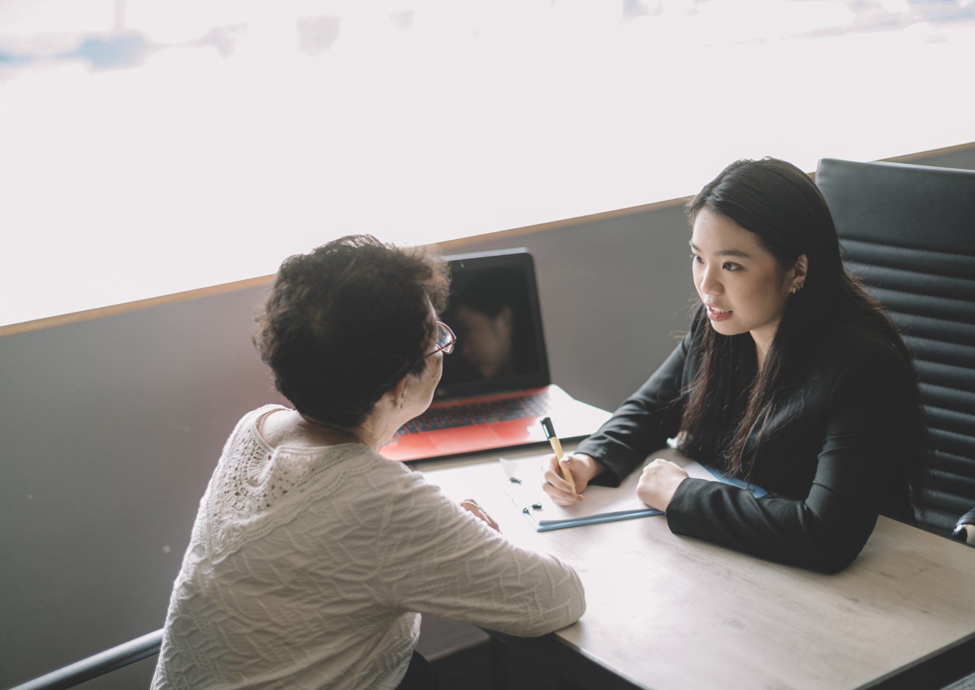 Agent Talking To A Client Regarding Her Insurance — Bayonne, NJ — Long Agency Agent Talking To A Client Regarding Her Insurance — Bayonne, NJ — Long Agency