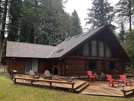 Log cabin with deck. Log cabin with deck.