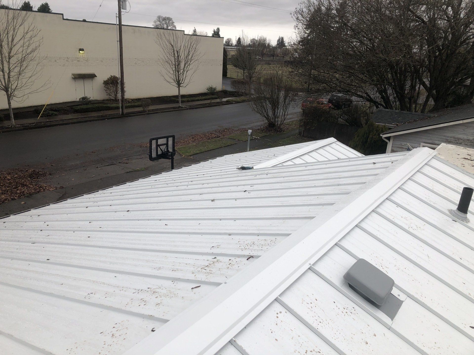 White metal roof panels.