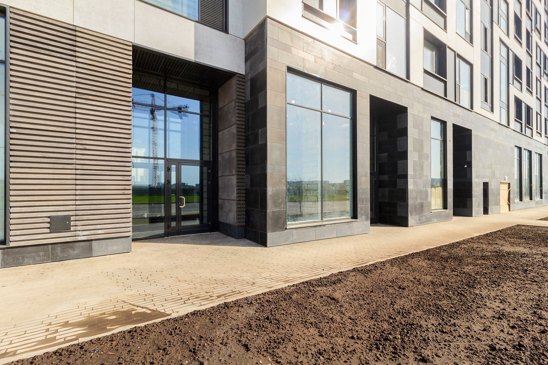 Neubau mit hinterlüfteter Fassade