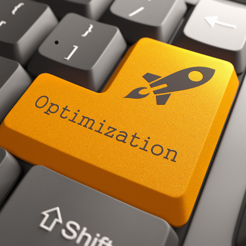 Keyboard with optimization button in orange with rocket icon