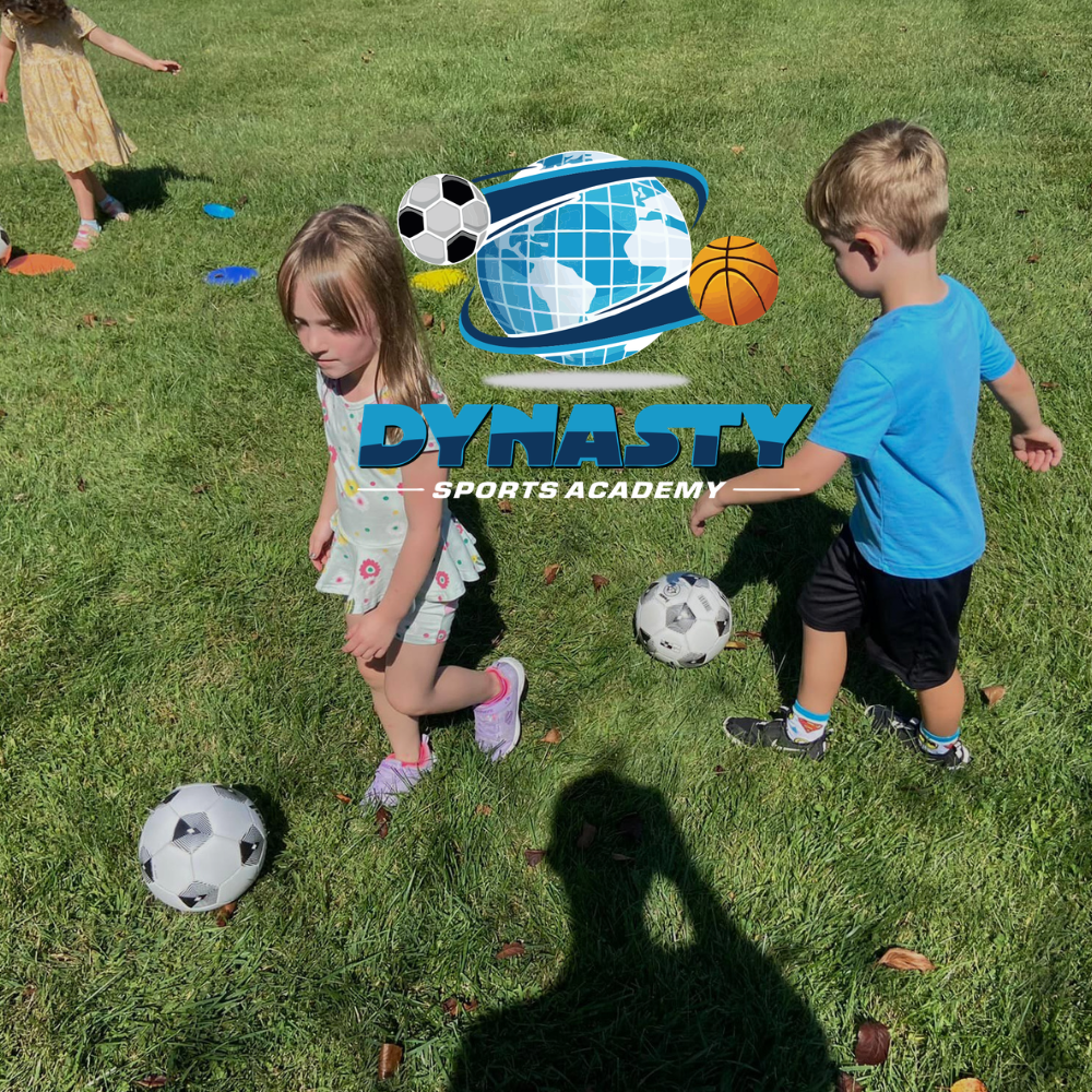 boy and girl kicking a soccer ball with Dynasty Sports Academy logo on top of image