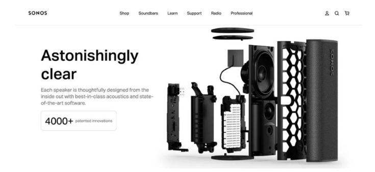Sonos speaker promo webpage with black speakers and the headline “Astonishingly clear”