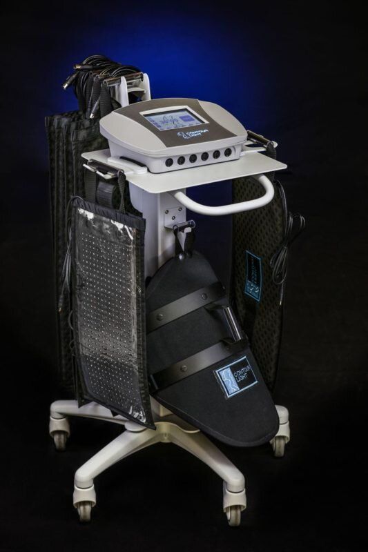 Medical device on a wheeled stand, featuring a control panel and an enclosed wrap for a foot.
