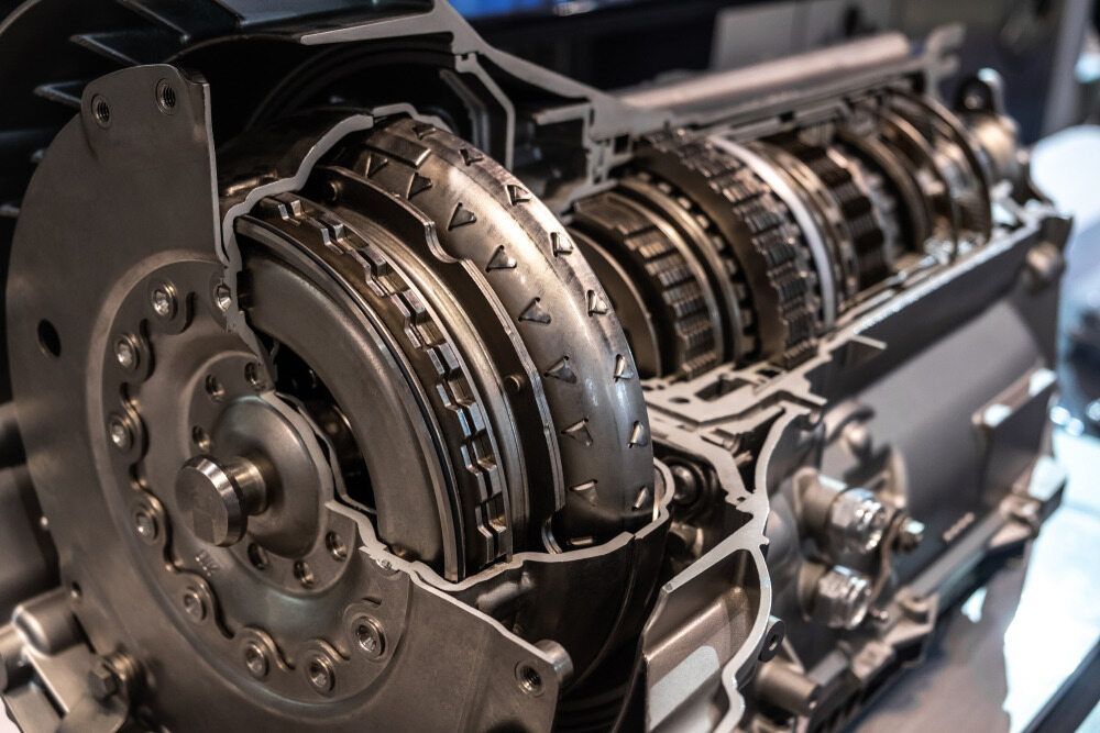 A Close Up of the Inside of a Car Engine — Cars to Cabs In Wickham, NSW