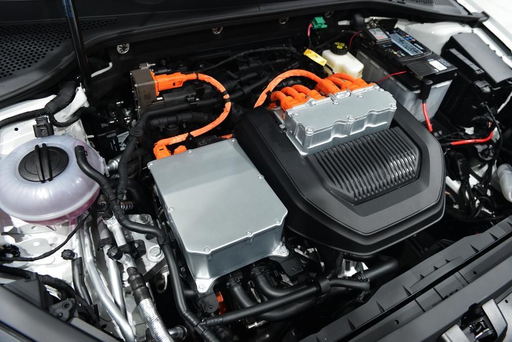 A Close Up of the Engine of a Car With the Hood Open — Cars to Cabs In Wickham, NSW