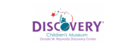 Discovery Children's Museum logo with purple text and a colorful child figure above the wordmark