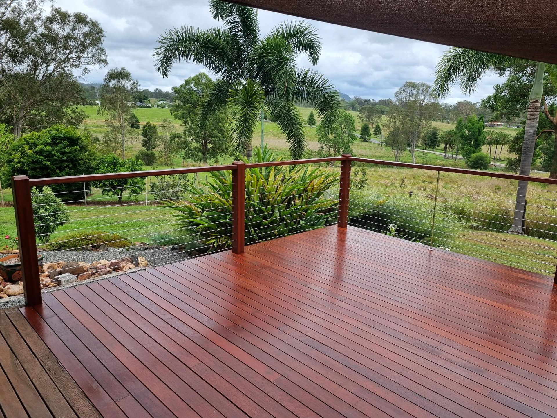 A House With a Fence in Front of It — RBG Building & Maintenance in Cooloola Cove, QLD