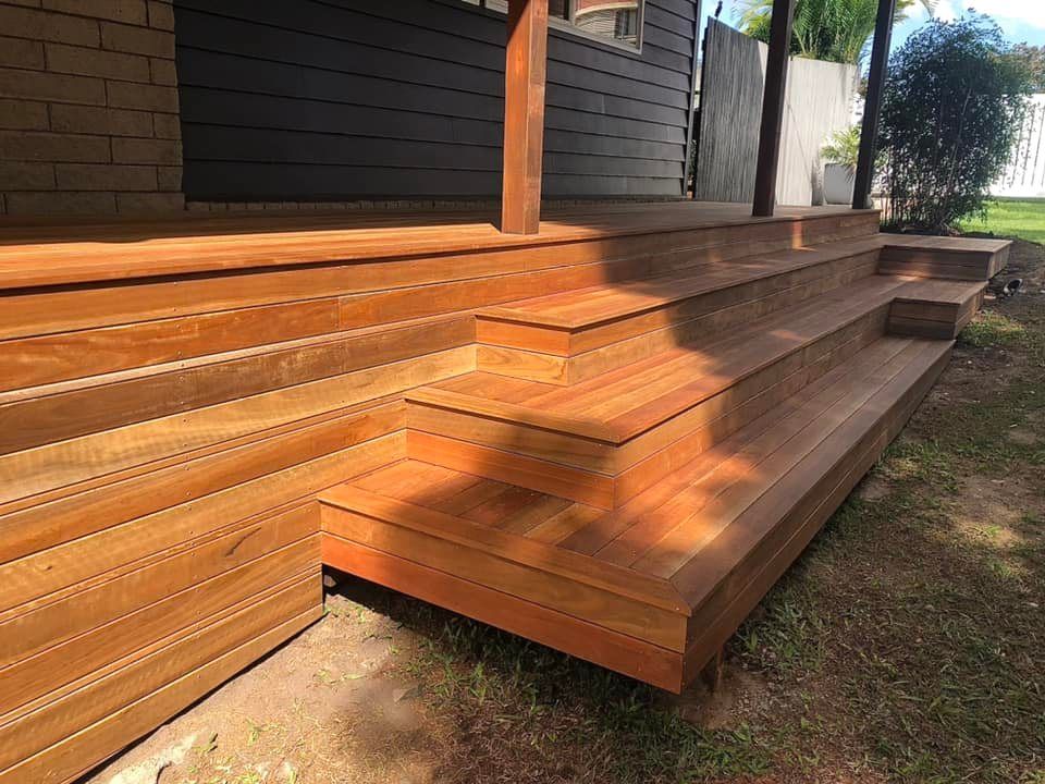 A Large Wooden Deck With a View of a Valley — RBG Building & Maintenance in Veteran, QLD