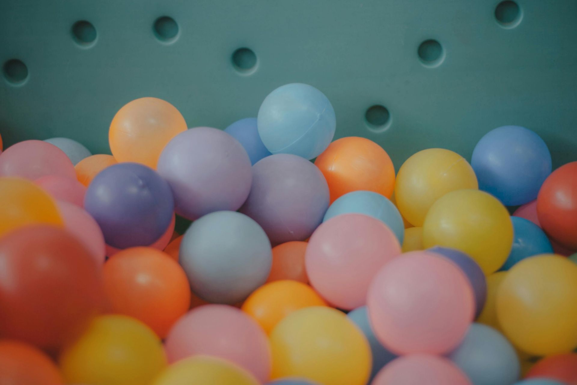 A pile of colourful plastic balls in a ball pit. — The Therapists Cairns In Cairns City, QLD