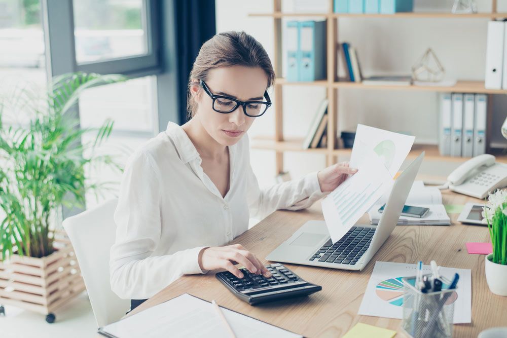 Professional Accountant Computing The Numbers On The Record Data — Dynamic Accounting Taxation Advisors in Bateau Bay, NSW