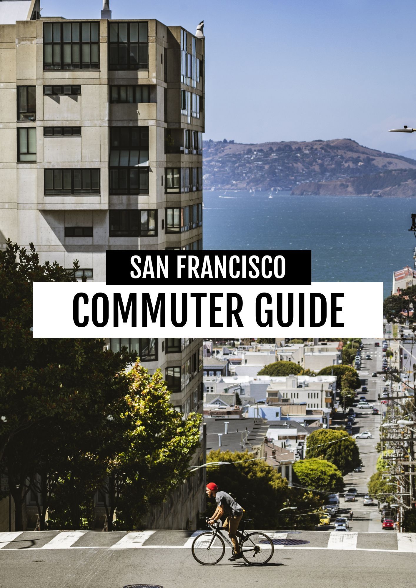 San Francisco commuter guide cover with cyclist on a steep street, city buildings, and bay view