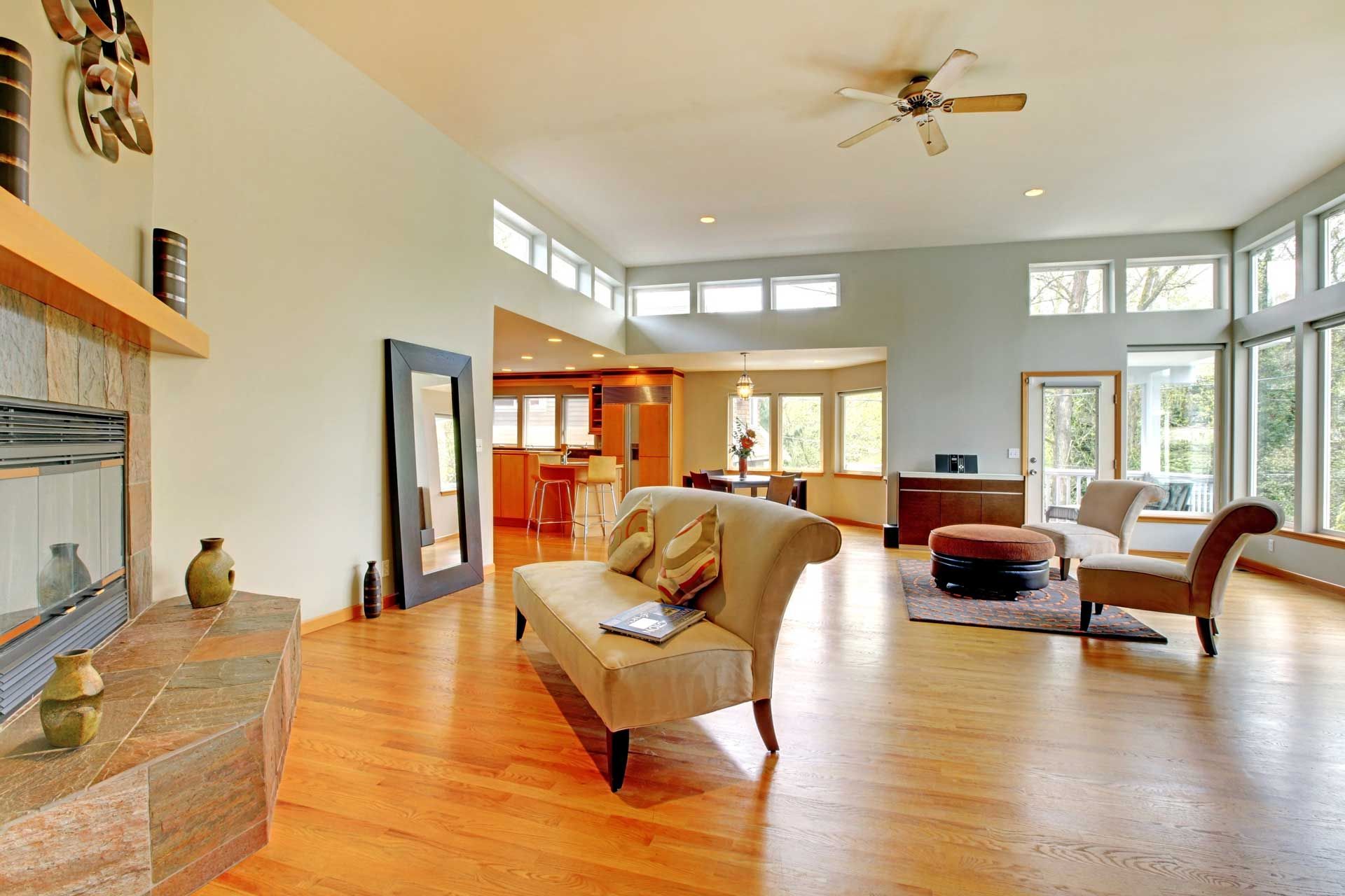 A living room filled with furniture and a fireplace.