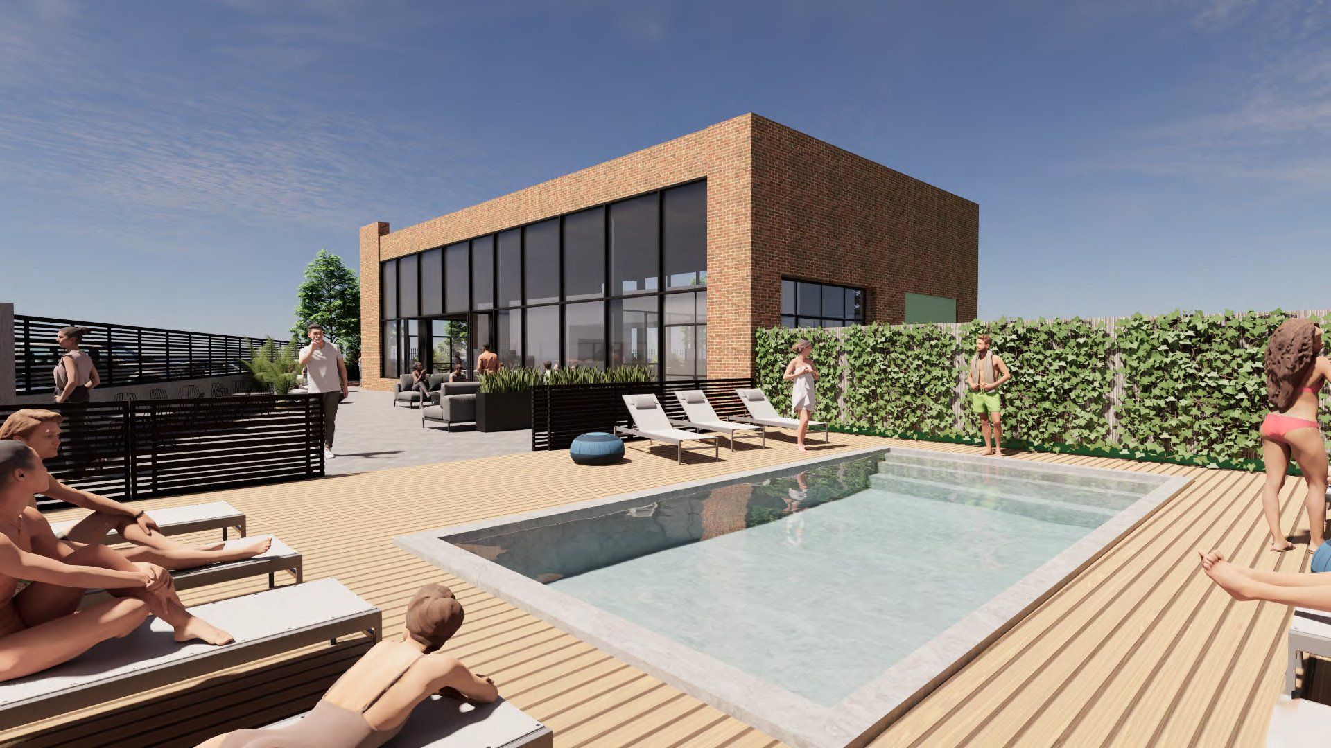 Modern rooftop pool deck with lounge chairs, brick building, and skyline views under a sunny sky