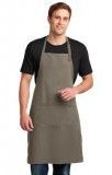 A man is wearing a brown apron and a black shirt.