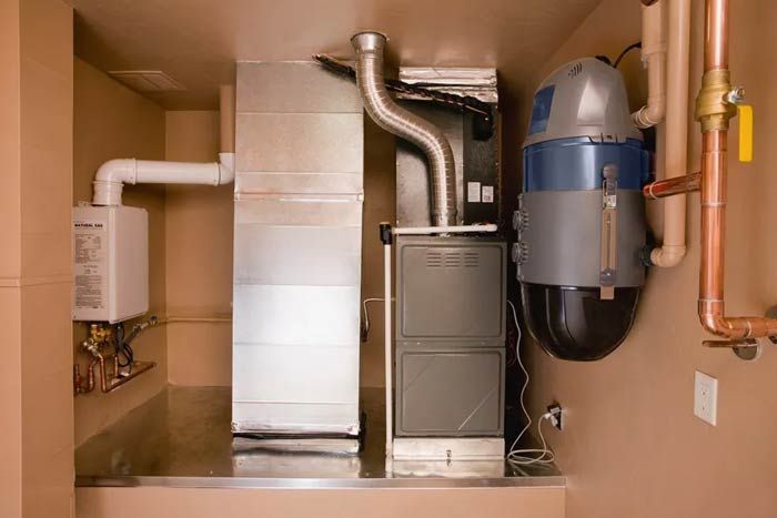 Furnace In The Basement — Rochester Hills, MI — Briarwood Heating & Cooling Home Heating Furnace — Rochester Hills, MI — Briarwood Heating & Cooling