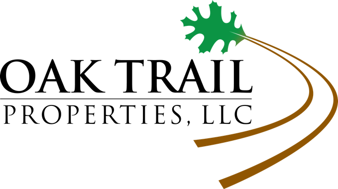 Oak Trail Properties, LLC logo with green oak leaf and gold swooshes on white background