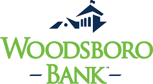 Woodsboro Bank logo with blue house and green “WOODSORO BANK” text