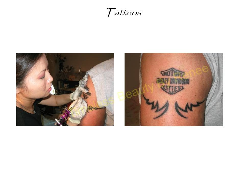 A woman is getting a harley davidson tattoo on her arm