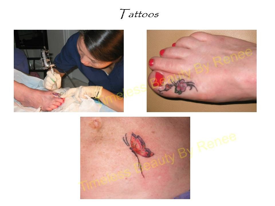A woman is getting a tattoo on someone 's foot
