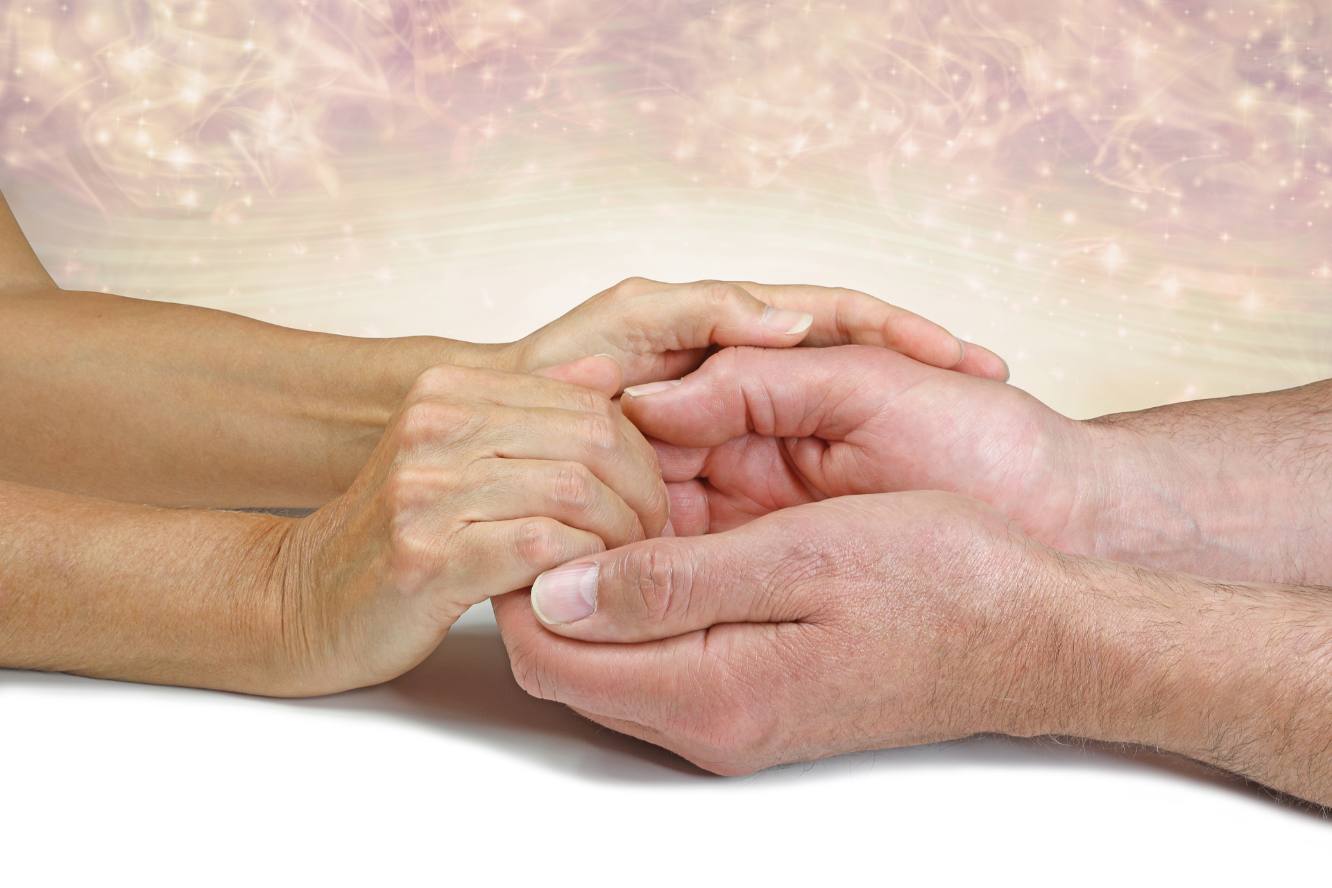 A man and a woman are holding hands.