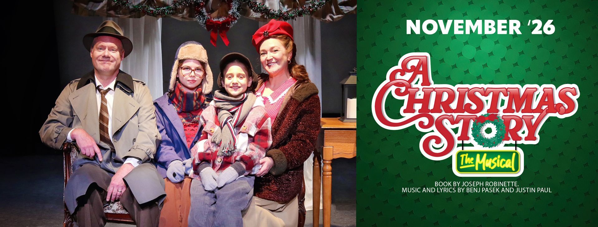 Family posing in front of a Christmas Story sign, with “November 26” and holiday decorations behind them