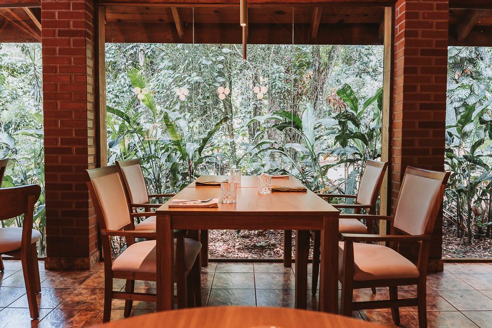 Elegant dining room Perubal, at Overo Lodge, offering a unique jungle dining experience for guests.