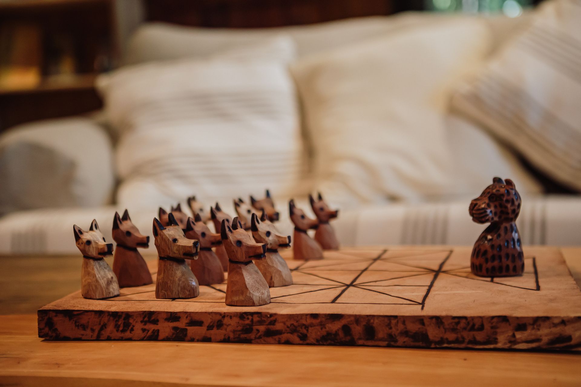 Unique wooden board game set available for guests at the boutique Iguazu jungle hotel, perfect for relaxation.